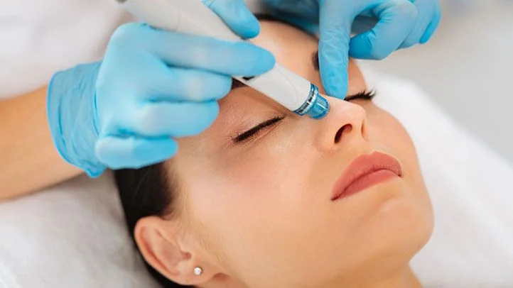 Hydrating facial treatment at an aesthetic skincare clinic